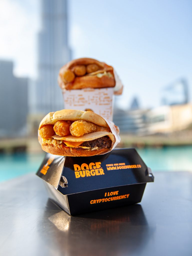 The future has arrived in dubai with the launch of doge burger: a dogecoin-inspired virtual restaurant.